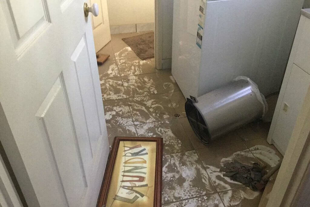 Flood water that has penetrated a home, carrying potential contaminated water throughout the house.